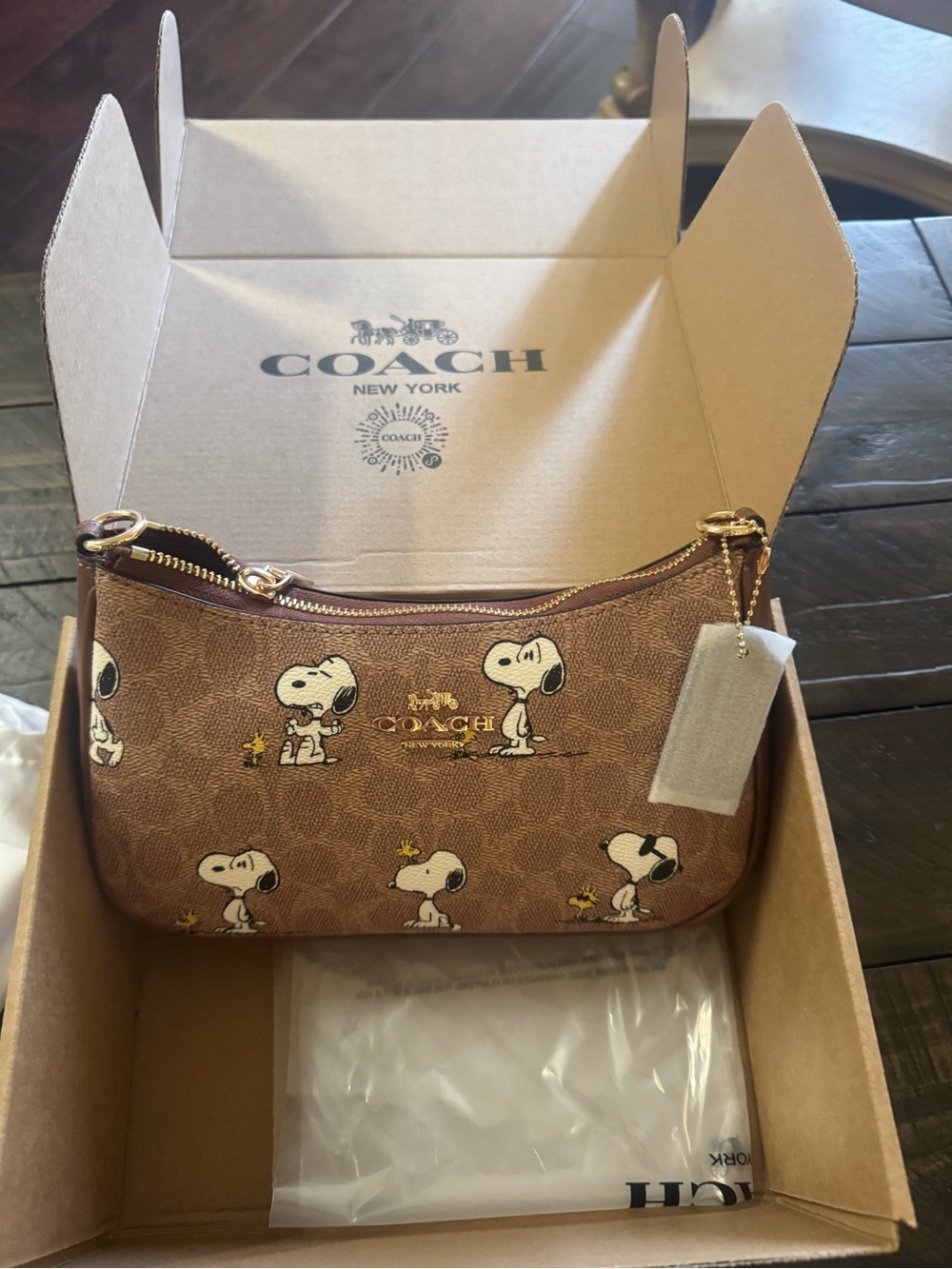 Coach Brown Snoopy Print Mini Wristlet